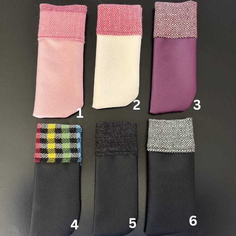 Six pairs of sunglasses with different color combinations on a dark background